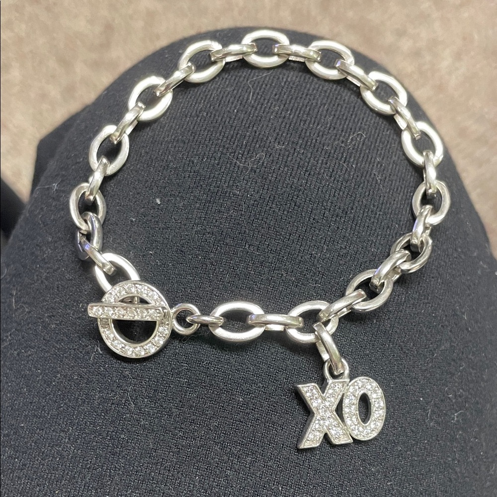 Sterling Silver diamond accent XO Charm Bracelet with toggle close - new